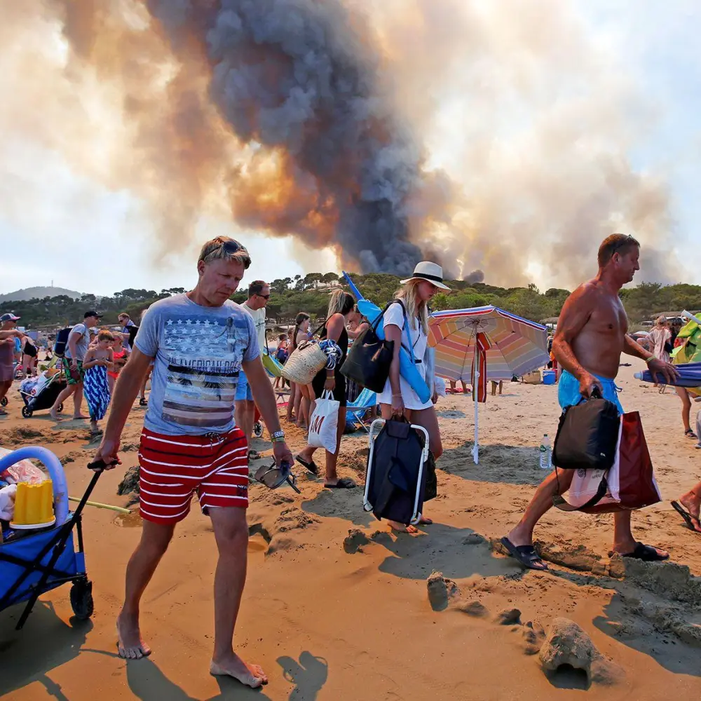 France Evacuates More Than 20,000 People as Massive Wildfires Sweep Tourist Region